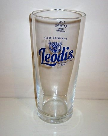 beer glass from the Leeds brewery in England with the inscription 'Leodis Leeds Brewery, Premium Leeds Lager Alc 4.6%'