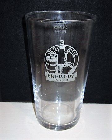 beer glass from the Old Mill  brewery in England with the inscription 'Old Mill Brewery Snaith'