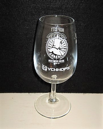 beer glass from the Northern Monk brewery in England with the inscription 'Northern Monk Brew Co, Ychhops'