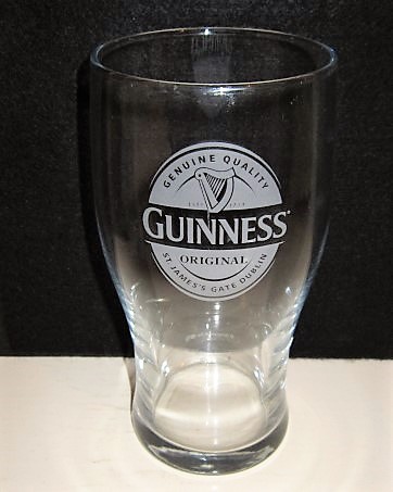 beer glass from the Guinness  brewery in Ireland with the inscription 'Guinness Original, Genuine Quality St. James's Gate Dublin'