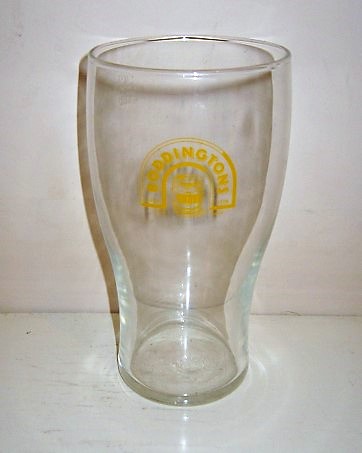 beer glass from the Boddingtons brewery in England with the inscription 'Boddingtons ESTD 1778 Trade Mark'