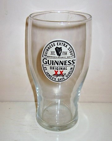 beer glass from the Guinness  brewery in Ireland with the inscription 'Guinness Original, Guinness Extra Stout EST 1759 Brewer's Since 1821 St. James's Gate Dublin'
