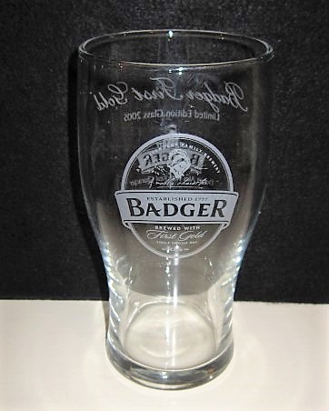 beer glass from the Hall & Woodhouse brewery in England with the inscription 'Badger An Independent Family Brewery Brewed With First Gold Single English Hop 4.0%'