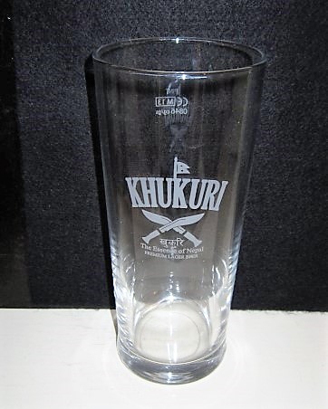 beer glass from the J W Lees brewery in England with the inscription 'Khukuri, The Essence Of Napal. Premium Lager Beer'