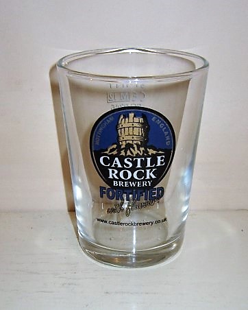 beer glass from the Castle Rock brewery in England with the inscription 'Castle Rock Brewery, Nottingham England Fortified. www.castlerockbrewery.co.uk'