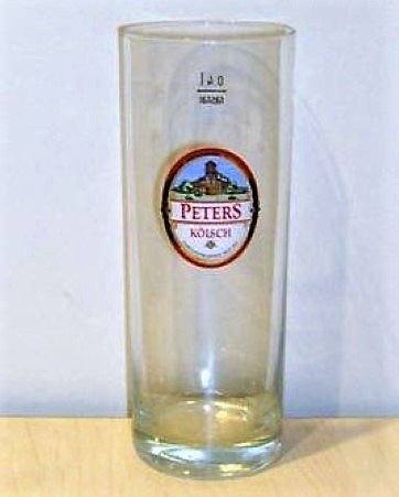 beer glass from the Peters Brauhaus brewery in Germany with the inscription 'Peters Kolsch Familientradition Seit 1847'