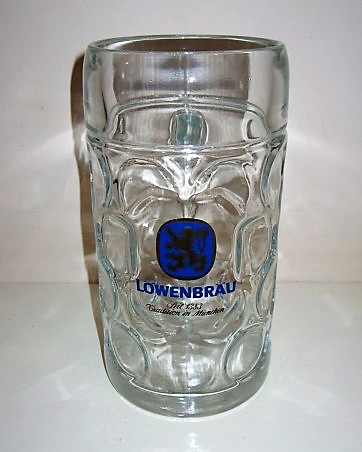beer glass from the Lowenbrau brewery in Germany with the inscription 'Lowenbrau Seit 1383 Tradition In Munchen'