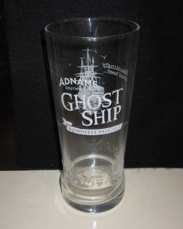 beer glass from the Adnams brewery in England with the inscription 'Adnams Southwold Ghostship, A Gastly Pale Ale'