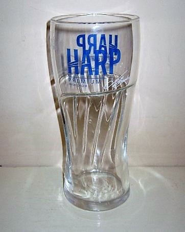 beer glass from the Guinness  brewery in Ireland with the inscription 'Harp Premium Irish Lager'