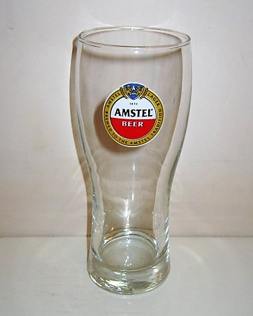 beer glass from the Amstel brewery in Netherlands with the inscription 'Amstel Beer 1870 Amstel Lager Brewed To The Amstel Tradition'