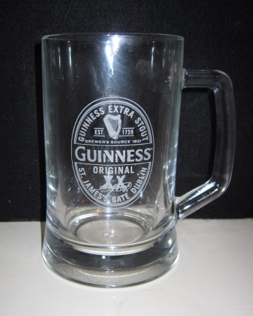 beer glass from the Guinness  brewery in Ireland with the inscription 'Guinness Original Guinness Extra Stout Est 1759 Brewer's Source 1821 St James's Gate Dublin'
