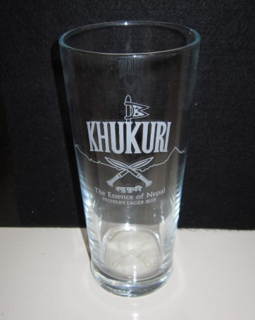 beer glass from the J W Lees brewery in England with the inscription 'Khukuri The Essence Of Nepal Premium Lager Beer'