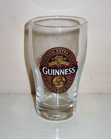 beer glass from the Guinness  brewery in Ireland with the inscription 'Guinness, Guinness Extra Stout St James's Gate Dublin'