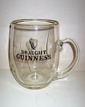 beer glass from the Guinness  brewery in Ireland with the inscription 'Draught Guinness'