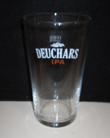 beer glass from the Caledonian  brewery in Scotland with the inscription 'Deuchars IPA, Brewed By Hand In Edinburgh @DEUCHARSIPA'