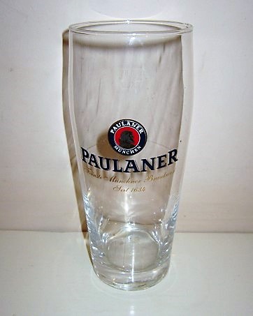 beer glass from the Paulaner brewery in Germany with the inscription 'Paulaner Paulaner Munchen Feinste Munchner Braukunst Seit 1634'