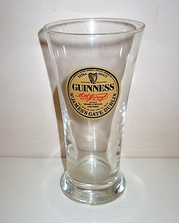 beer glass from the Guinness  brewery in Ireland with the inscription 'Guinness Brewed By Arthur Guinness Sion &Co Dublin Ltd Extra Stout Bottled By Brewers & Bottlers Everywhere Wo Bottle No Other Stout Or Porter, St James's Gate Dublin'