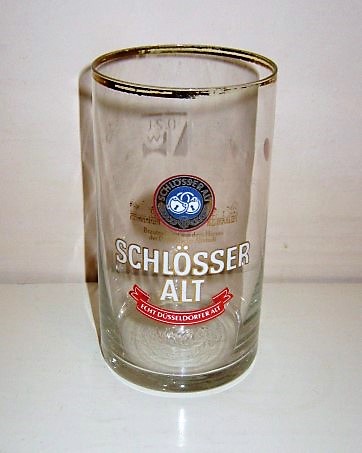 beer glass from the Schlosser  brewery in Germany with the inscription 'Schlosser Alt Dusseldorf, Schlosser Alt Echt Dusseldorfer Alt'