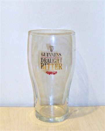 beer glass from the Guinness  brewery in Ireland with the inscription 'Guinness Draught Bitter'
