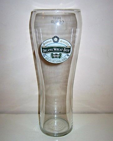 beer glass from the Samuel Smith brewery in England with the inscription 'Samuel Smiths Organic Wheat Beer Brewed At The Old Brewery Tadcaster N/Yorkshire By Samuel Smiths A Small Independent UK Brewery'