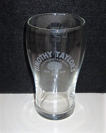 beer glass from the Timothy Taylor brewery in England with the inscription 'Timothy Taylor Championship Beers EST 1858'