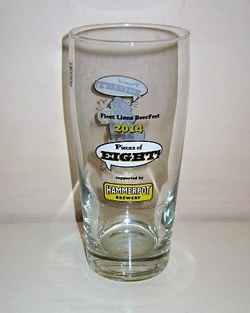 beer glass from the Hammerpot  brewery in England with the inscription 'Fleet Lions Beerfest 2014 Pieces Of Eight Supported By Hammerpot Brewery'