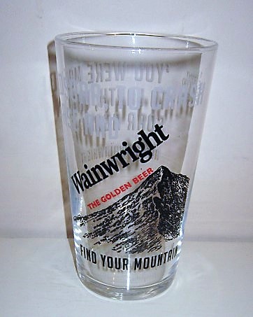 beer glass from the Thwaites brewery in England with the inscription 'Wainwright The Golden Beer, Find Your Mountain'