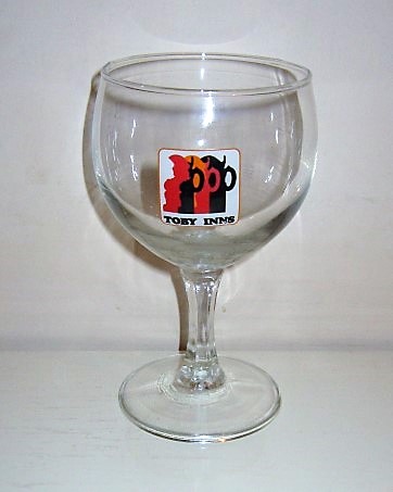 beer glass from the Charrington brewery in England with the inscription 'Toby Inns'