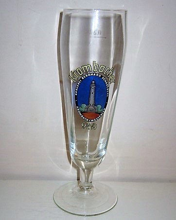 beer glass from the Krombacher brewery in Germany with the inscription 'Krombacher Brauerei Bernhard Schadeberg Krombach/Westfalen Pils'