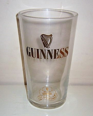 beer glass from the Guinness  brewery in Ireland with the inscription 'Guinness, Draught Guinness St Patrick's Day'