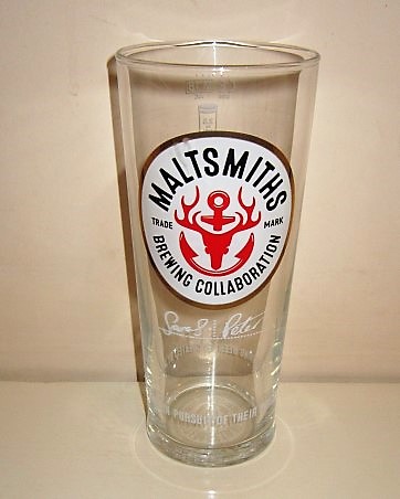 beer glass from the Caledonian  brewery in Scotland with the inscription 'Maltsmiths Brewing Collaboration, Created By Our Maltsmiths In Pursuit Of Their Passion For Refreshing Beer'