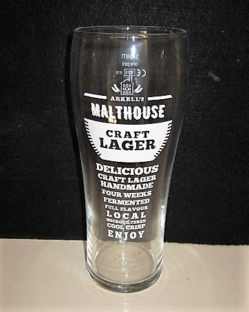 beer glass from the Arkell's  brewery in England with the inscription 'Arkell's Malthouse Craft Lager, Delicious Craft Lager Handmade, Four Weeks Fermentated, Full Flavour Local Microfiltered, Cool Crisp, Enjoy'