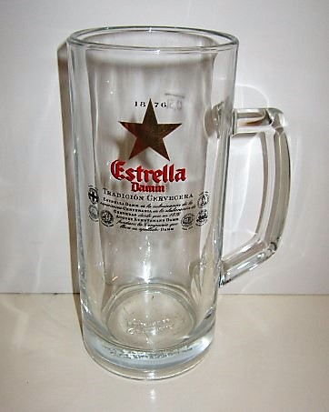 beer glass from the Damm brewery in Spain with the inscription '1876 Estrella Damm Tradition Cervecera'