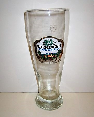 beer glass from the MC Wieninger brewery in Germany with the inscription 'Wieninge Hefeweizen, Wieninger Bier Mit Reinem Quellwasser Wurzig Gebraut'