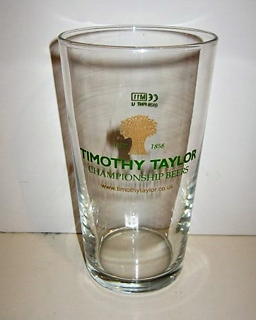beer glass from the Timothy Taylor brewery in England with the inscription 'Timothy Taylor Est 1858 Championship Beers, www.timothytaylor.co.uk'