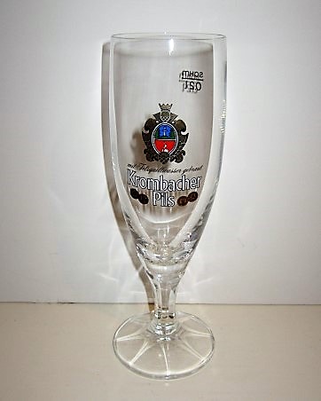 beer glass from the Krombacher brewery in Germany with the inscription 'Krombacher Pils Eine Perle Der Nature'