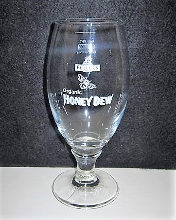 beer glass from the Fuller's brewery in England with the inscription 'Griffin Brewery Fuller's Chiswick Organic Honey Dew'