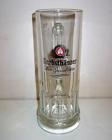 beer glass from the Herbsthauser brewery in Germany with the inscription 'Herbsthauser Bier Spezialitaten, Herbsthauser Stammhaus Anno 1581'