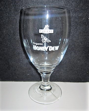 beer glass from the Fuller's brewery in England with the inscription 'Griffin Brewery Fuller's Chiswick Organic Honey Dew'