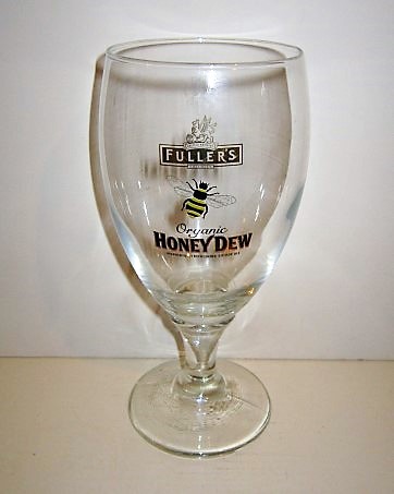 beer glass from the Fuller's brewery in England with the inscription 'Fuller's Organic Honey Dew, Wonderfully Refreshing Golden Ale '