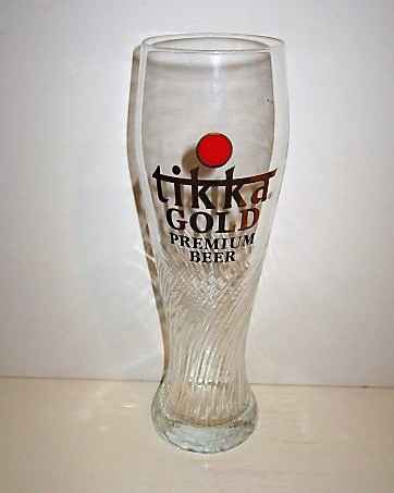 beer glass from the Van Steenberge brewery in Belgium with the inscription 'Tikka Gold Premium Beer'