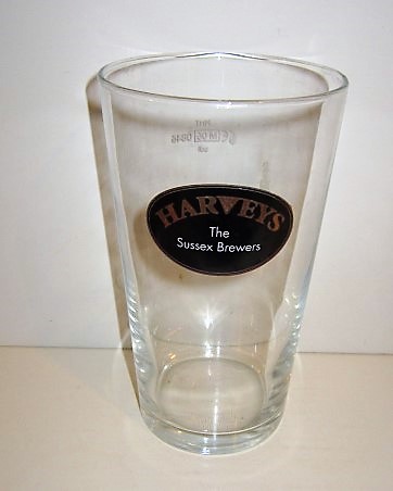 beer glass from the Harvey & Son brewery in England with the inscription 'Harveys The Sussex Brewers'