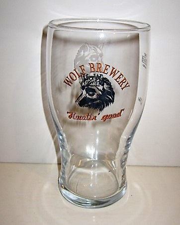 beer glass from the Wolf brewery in England with the inscription 'Wolf Brewery Howlin Good'