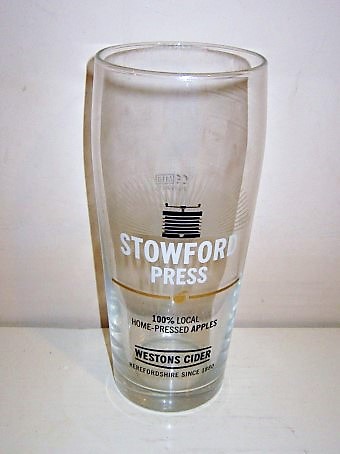 beer glass from the Westons Cider brewery in England with the inscription 'Stowford Press 100% Local Home Pressed Apples Westons Cider Herefordshire Since 1880'