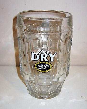 beer glass from the Pelican-Pelforth brewery in France with the inscription 'La Dry Beer.Biere.Bier.Birra. Beer.Biere.Bier.Birra. '