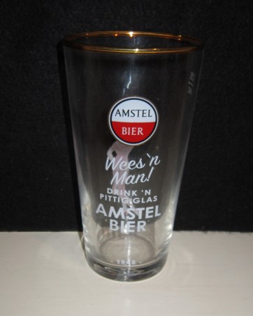 beer glass from the Amstel brewery in Netherlands with the inscription 'Amstel Bier Wees'n Man! Drink'n Pittig Glas Amstel Bier 1948'