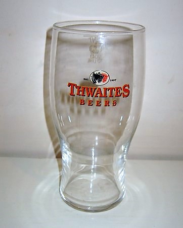 beer glass from the Thwaites brewery in England with the inscription 'ESTD 1807 Thwaites Beer'