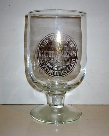 beer glass from the Guinness  brewery in Ireland with the inscription 'Guinness The bottle of Supporters Club Join Now Nothing Tastes So Good'