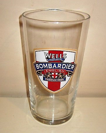 beer glass from the Charles Wells brewery in England with the inscription 'Wells Brewer Since 1876 Bombardier English Premium Beer'