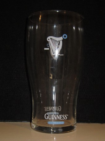 beer glass from the Guinness  brewery in Ireland with the inscription 'Guinness Extra Cold'